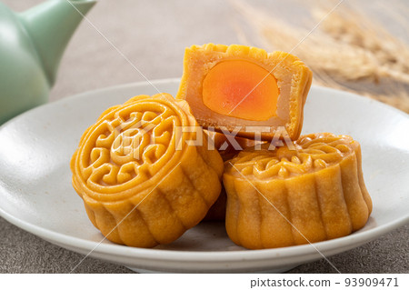 Delicious Cantonese moon cake for Mid-Autumn Festival food mooncake on gray table background. 93909471