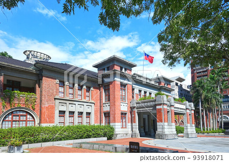Hsinchu, Taiwan - August 15, 2022: The front entrance of the Hsinchu City Government Office Building. Built in the 1920s and made of red brick. Hsinchu, Taiwan - August 15, 2022: The front entrance of the Hsinchu City Government Office Building. Built in the 1920s and made of red brick. 93918071