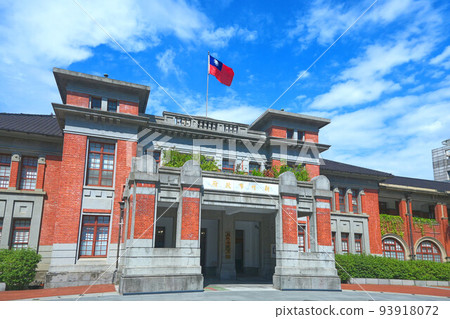 Hsinchu, Taiwan - August 15, 2022: The front entrance of the Hsinchu City Government Office Building. Built in the 1920s and made of red brick. Hsinchu, Taiwan - August 15, 2022: The front entrance of the Hsinchu City Government Office Building. Built in the 1920s and made of red brick. 93918072