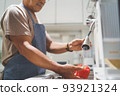 Asian senior man preparing washing bell pepper 93921324