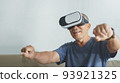 Asian Senior with virtual reality game 93921325