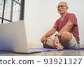 Asian senior man looking while exercises 93921327