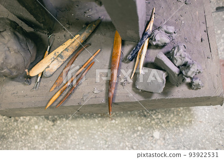 Tools sculptor for create sculpt bust clay human sculpture. Statue craft creation workshop. Tools sculptor for create sculpt bust clay human sculpture. Statue craft creation workshop. 93922531