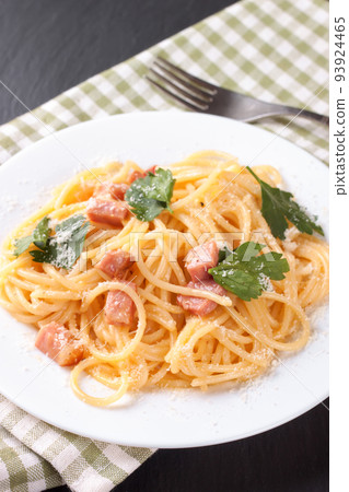 Pasta Carbonara served on a white plate. Pasta Carbonara served on a white plate. 93924465