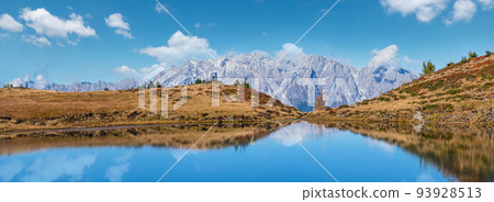 Autumn alpine Kleiner Paarsee or Paarseen lake, Land Salzburg, Austria. Alps Hochkonig rocky mountain group view in far. Autumn alpine Kleiner Paarsee or Paarseen lake, Land Salzburg, Austria. Alps Hochkonig rocky mountain group view in far. 93928513