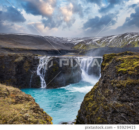 Picturesque waterfall Sigoldufoss autumn view. Season changing in southern Highlands of Iceland. Picturesque waterfall Sigoldufoss autumn view. Season changing in southern Highlands of Iceland. 93929415