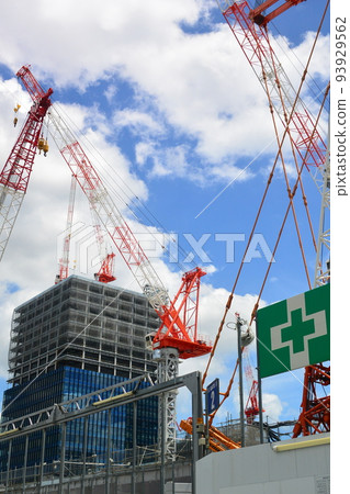 Scenery in front of the station with a forest of cranes during development work Scenery in front of the station with a forest of cranes during development work 93929562