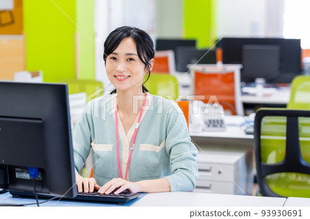 Young business woman in the office Young business woman in the office 93930691