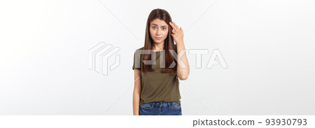 Girl with a suspicious look and hand on her side on a white isolated background. Girl with a suspicious look and hand on her side on a white isolated background. 93930793