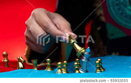 Chess on Red Blue Fabric as abstract of USA, China, Taiwan Crisis Map. Conflict Dispute military Strategy of China surrounding Taiwan border sea is to sanction trade chip technology. copy space Chess on Red Blue Fabric as abstract of USA, China, Taiwan Crisis Map. Conflict Dispute military Strategy of China surrounding Taiwan border sea is to sanction trade chip technology. copy space 93932033