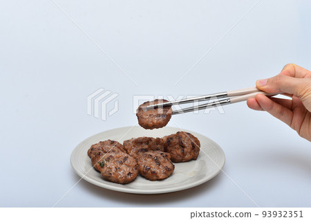 Tteokgalbi on a bowl Tteokgalbi on a bowl 93932351