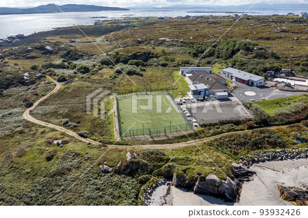 Aerial view of Arranmore GAA pitch in Leabgarrow on Arranmore Island in County Donegal, Republic of Ireland 93932426