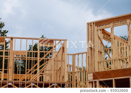 New house construction with wooden beams the ceiling and wall 93932608