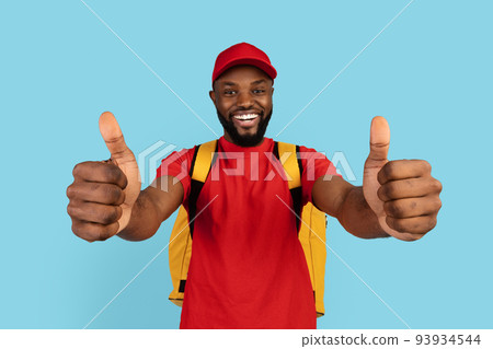 Best Delivery Service. Happy Black Courier Wearing Thermo Backpack Showing Thumb Ups Best Delivery Service. Happy Black Courier Wearing Thermo Backpack Showing Thumb Ups 93934544