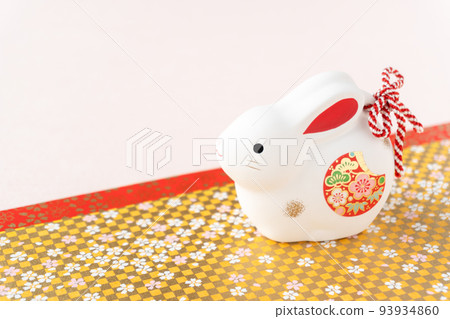 New Year's card for the year of the rabbit | Japanese paper and rabbit with golden cherry blossom pattern New Year's card for the year of the rabbit | Japanese paper and rabbit with golden cherry blossom pattern 93934860