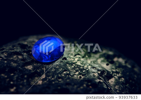 Blue Sapphire Gemstone on Natural Stone Blue Sapphire Gemstone on Natural Stone 93937633