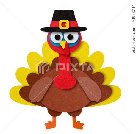 Turkey bird in a hat cut out of colored paper on a white background. Isolated Turkey bird in a hat cut out of colored paper on a white background. Isolated 93938214