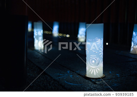 Beautiful lanterns lit up and placed on the ground Beautiful lanterns lit up and placed on the ground 93939185