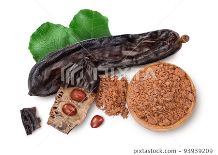 Carob pod and powder isolated on white background with full depth of field. Top view. Flat lay 93939209