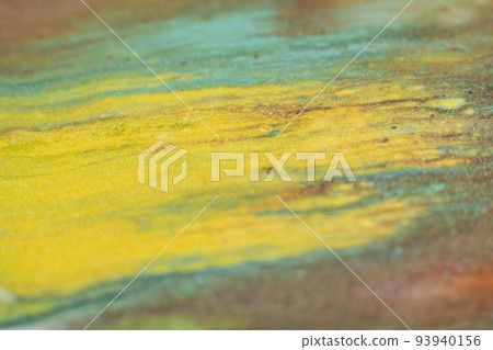 Paint blend. Artistic hobby. Colorful abstract bakground. Yellow brown glitter paints mix Paint blend. Artistic hobby. Colorful abstract bakground. Yellow brown glitter paints mix 93940156