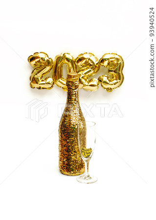 New year celebration background. Champagne bottle and 2023 numbe 93940524
