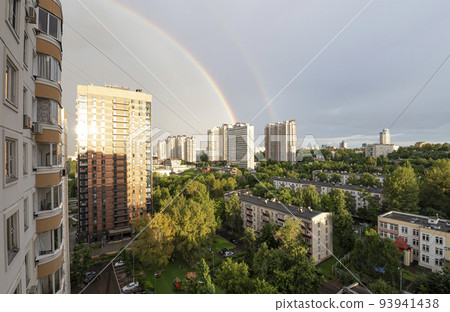 Rainbow after heavy rain (shower) with a thunderstorm and aerial view of Moscow (summer cloudy day), Russia Rainbow after heavy rain (shower) with a thunderstorm and aerial view of Moscow (summer cloudy day), Russia 93941438
