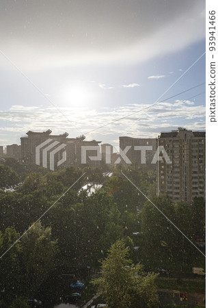 Heavy rain (shower) with a thunderstorm at sunset and aerial view of Moscow (summer cloudy day), Russia Heavy rain (shower) with a thunderstorm at sunset and aerial view of Moscow (summer cloudy day), Russia 93941466