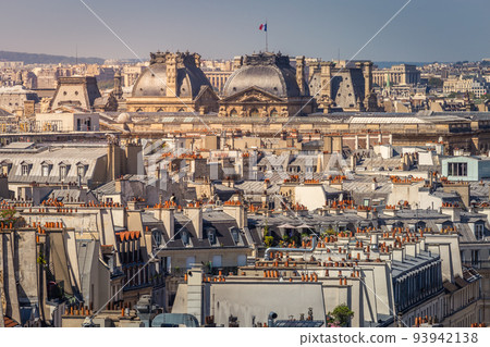 Parisian Roofs of Montparnasse and french flag Paris, France 93942138
