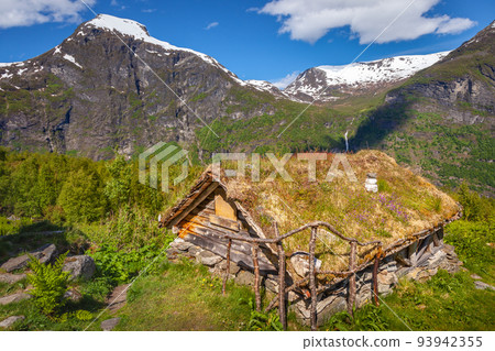 Geiranger typical rustic barn with grassy roof, Norway, Northern Europe Geiranger typical rustic barn with grassy roof, Norway, Northern Europe 93942355