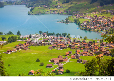 Aerial view on Lungern and turquoise lake, Switzerland, Europe Aerial view on Lungern and turquoise lake, Switzerland, Europe 93942521