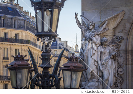 Parisian architecture, algel and street light near opera, France 93942651