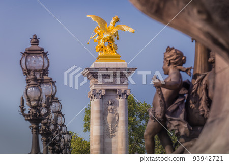 Line of Street lights and statues in Pont Alexandre III, Paris, france 93942721