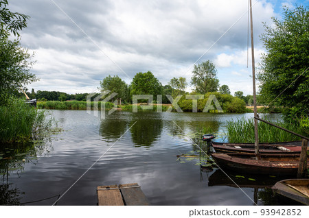 Haerst, Overijssel, The Netherlands,  Ferry station and jetty with small vessels at the River Vecht 93942852