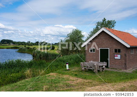 Holten, The Netherlands, Rustic shed at the borders of the natural pond 93942853