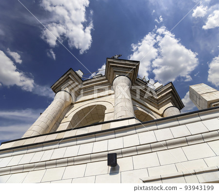 Fragment of the Radisson Collection Hotel (historical name Hotel Ukraina, made in Stalinist Empire style) against the background of the sky with clouds, Moscow, Russia 93943199