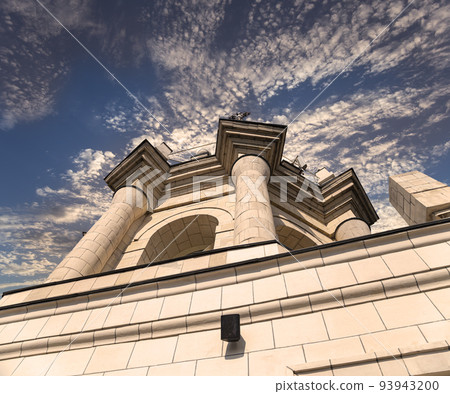 Fragment of the Radisson Collection Hotel (historical name Hotel Ukraina, made in Stalinist Empire style) against the background of the sky with clouds, Moscow, Russia 93943200