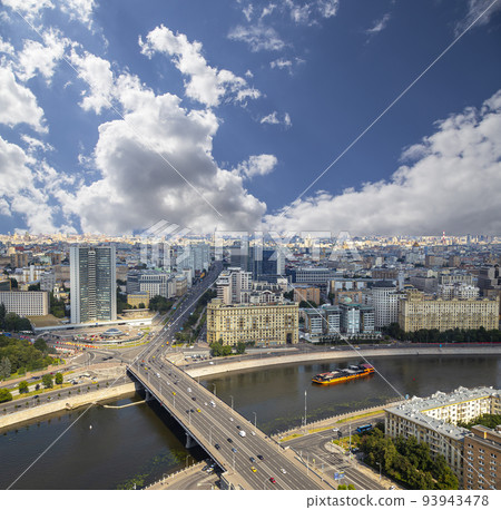 Aerial view of center of Moscow against the background of the sky with clouds (formerly Secretariat of the Council for Mutual Economic Assistance (CMEA), Russia 93943478