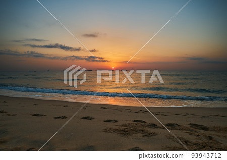beautiful sunrise on a calm sea 93943712