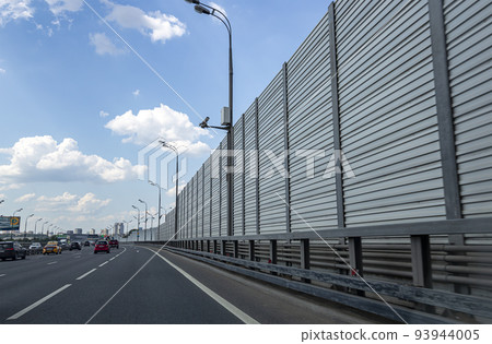 Daytime traffic on one of the streets in Moscow on a working day, Russia Daytime traffic on one of the streets in Moscow on a working day, Russia 93944005