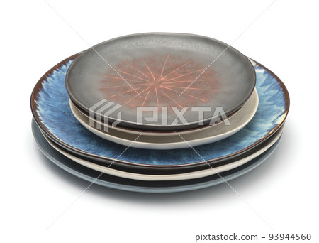 Stack of rough trendy handmade ceramic plate Stack of rough trendy handmade ceramic plate 93944560