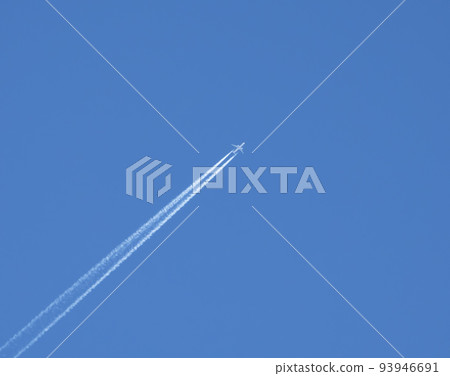 Airplane flies against a background of blue sky Airplane flies against a background of blue sky 93946691