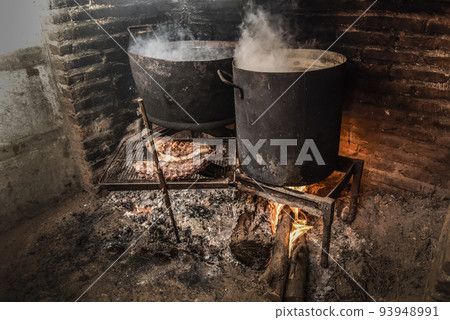 Pig ribbs barbecue , Patagonia, Argentina 93948991