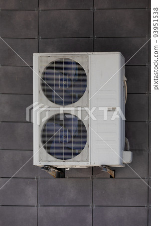 air conditioning unit Central split system hanging outside the building 93951538