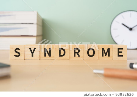 Image of Syndrome/Syndrome | A desk with a block written as SYNDROME 93952626