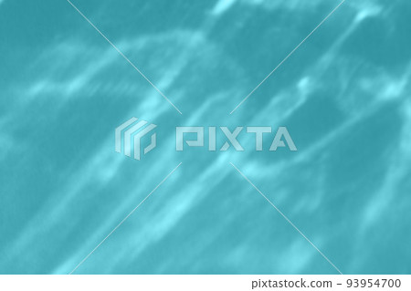 Caustic effect light refraction on blue wall overlay photo mockup, blurred sun rays refracting through glass prism with shadow. Abstract natural light refraction silhouette on water surface 93954700