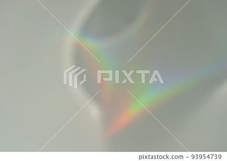Abstract natural light refraction silhouette on water surface mock up.Caustic effect light refraction on white wall overlay photo mockup, blurred sun rays refracting through glass prism Abstract natural light refraction silhouette on water surface mock up.Caustic effect light refraction on white wall overlay photo mockup, blurred sun rays refracting through glass prism 93954739