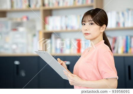 Young nurse woman counseling Young nurse woman counseling 93956091