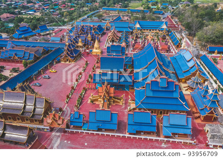 Aerial view of Wat Phiphat Mongkhon blue temple in Sukhothai, Thailand Aerial view of Wat Phiphat Mongkhon blue temple in Sukhothai, Thailand 93956709