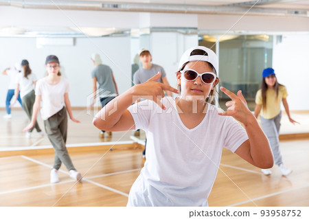 Teenage girl hip hop dancer during class Teenage girl hip hop dancer during class 93958752