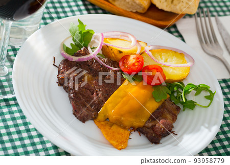 Well done beef loin fried with cheese Well done beef loin fried with cheese 93958779